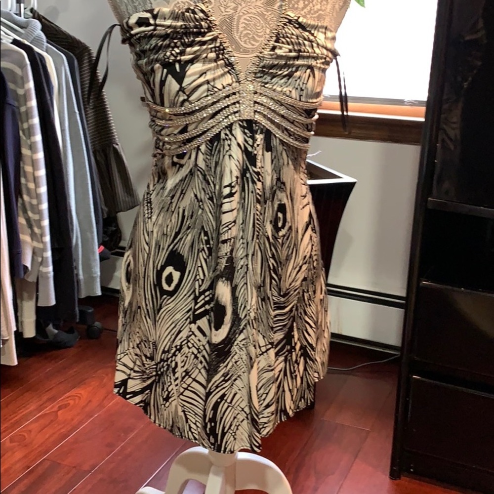 Gorgeous print dress with clear stones on top